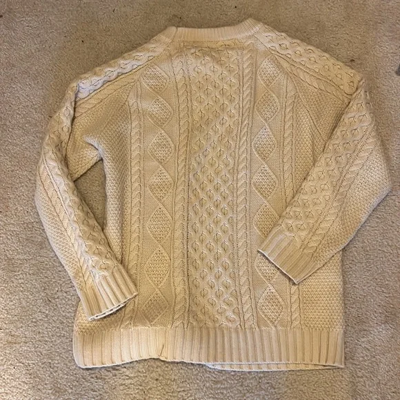 large cream color Mens Aran knit fisherman’s sweater. Knives out sweater